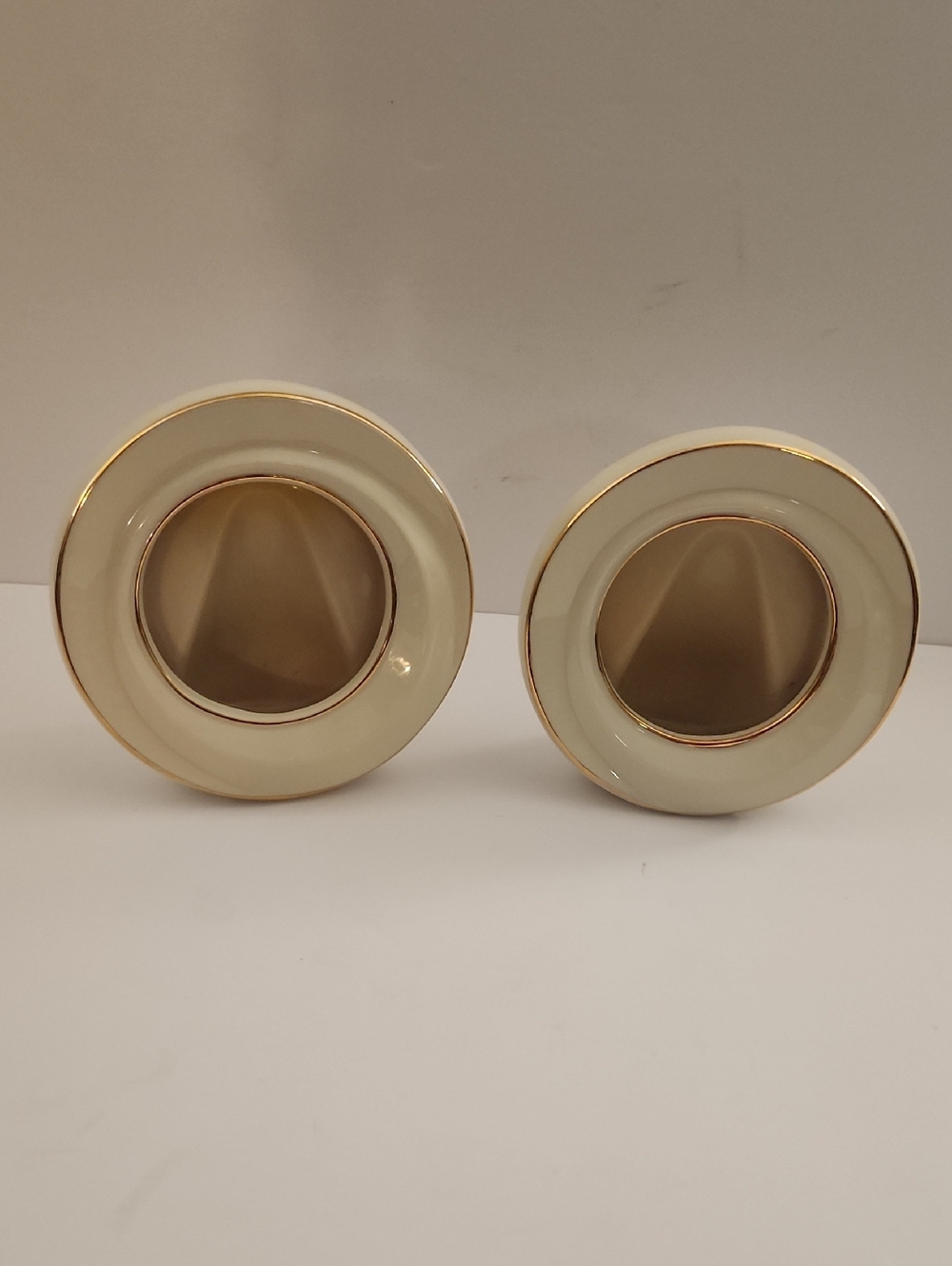 Pair of Lenox Cream and Gold Round Picture Frames.